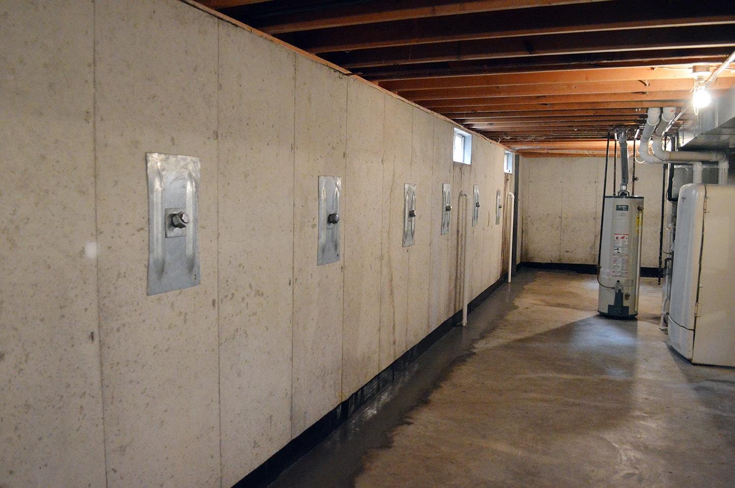 Bowing wall reinforced after repair